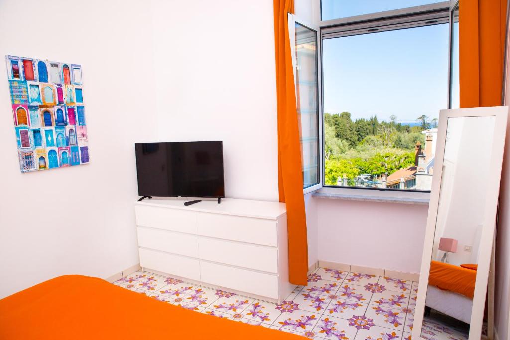 TV a/nebo společenská místnost v ubytování Artis Domus Relais & Spa