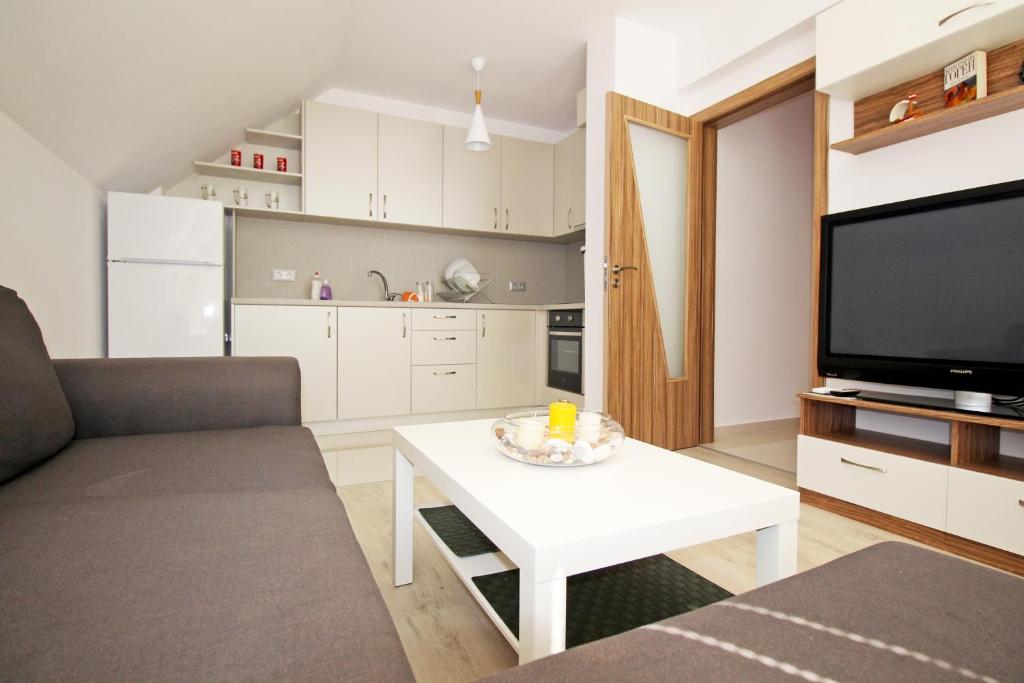 Kuchyň nebo kuchyňský kout v ubytování Lilly Apartments