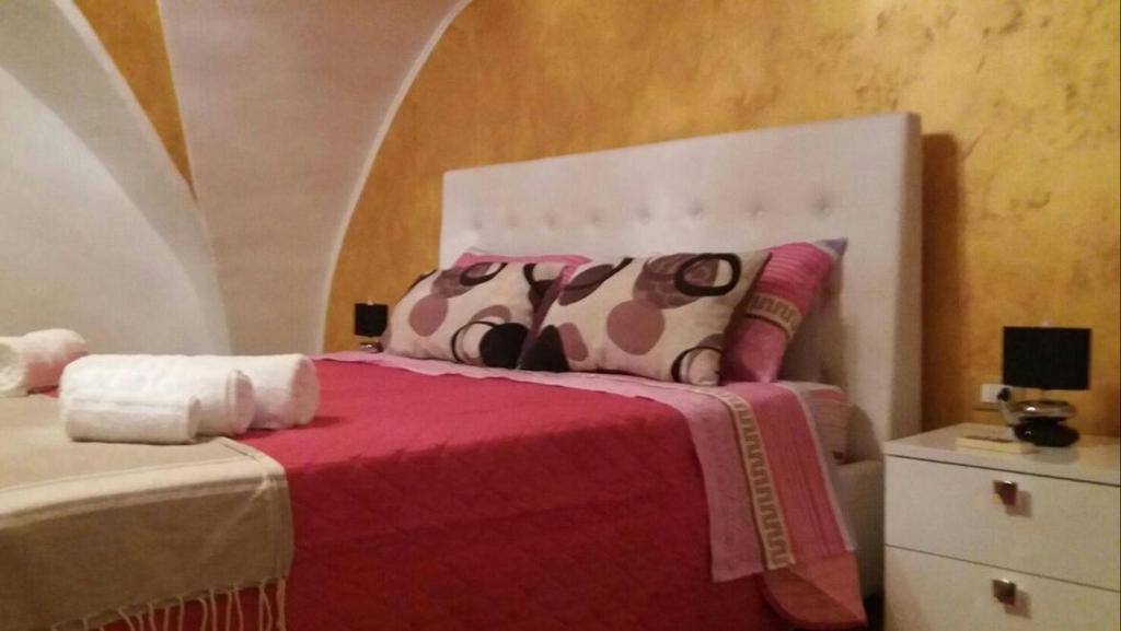 Postel nebo postele na pokoji v ubytování Aia Lucia B&B