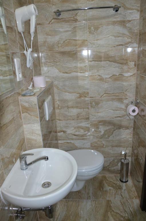 Koupelna v ubytování LAS PALMAS ROOMS