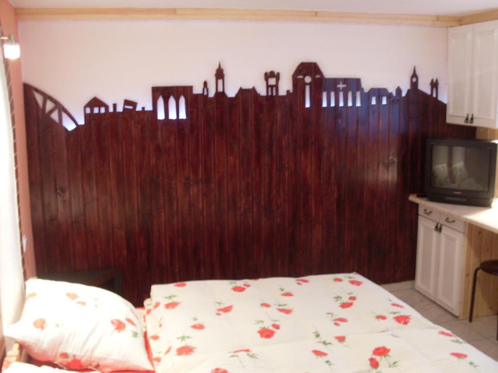 Postel nebo postele na pokoji v ubytování Apartament na Wrzosach