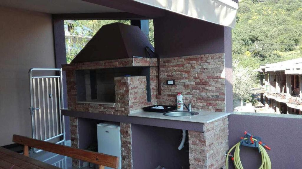 Kuchyň nebo kuchyňský kout v ubytování Vip Apartmani Canj