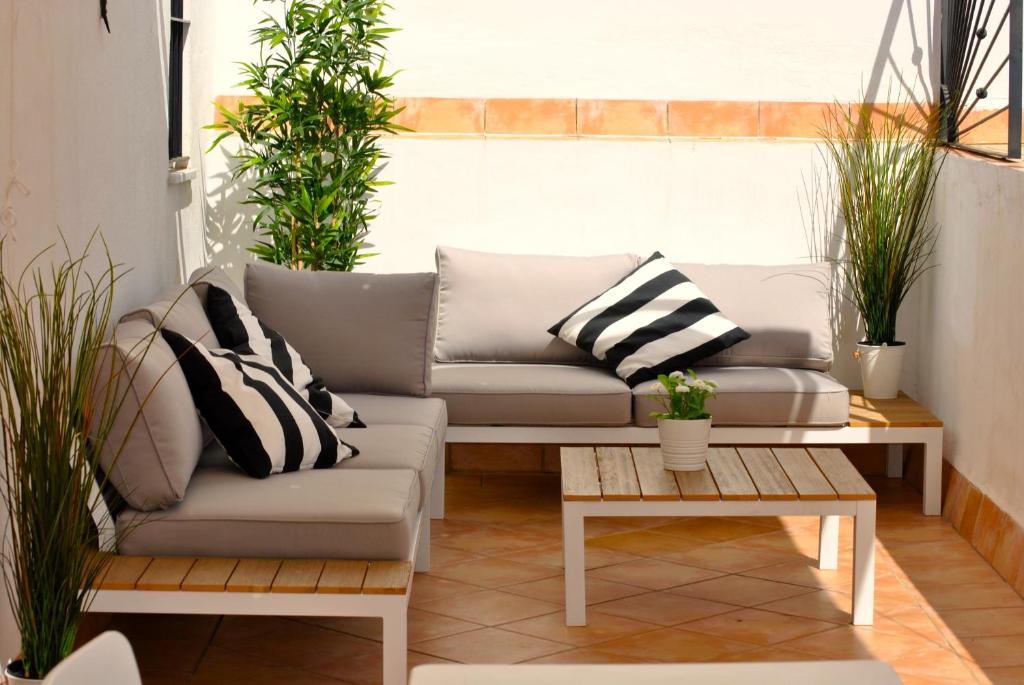 Posezení v ubytování Triana Pelay Suites