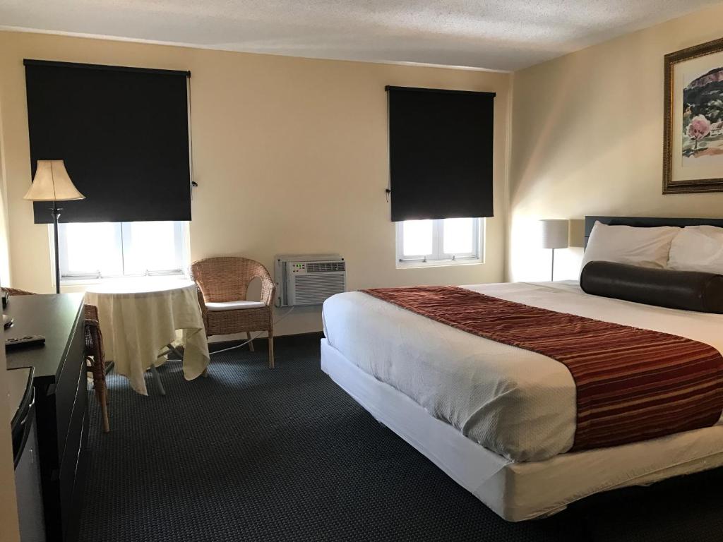 Postel nebo postele na pokoji v ubytování Hotel Villa del Sol