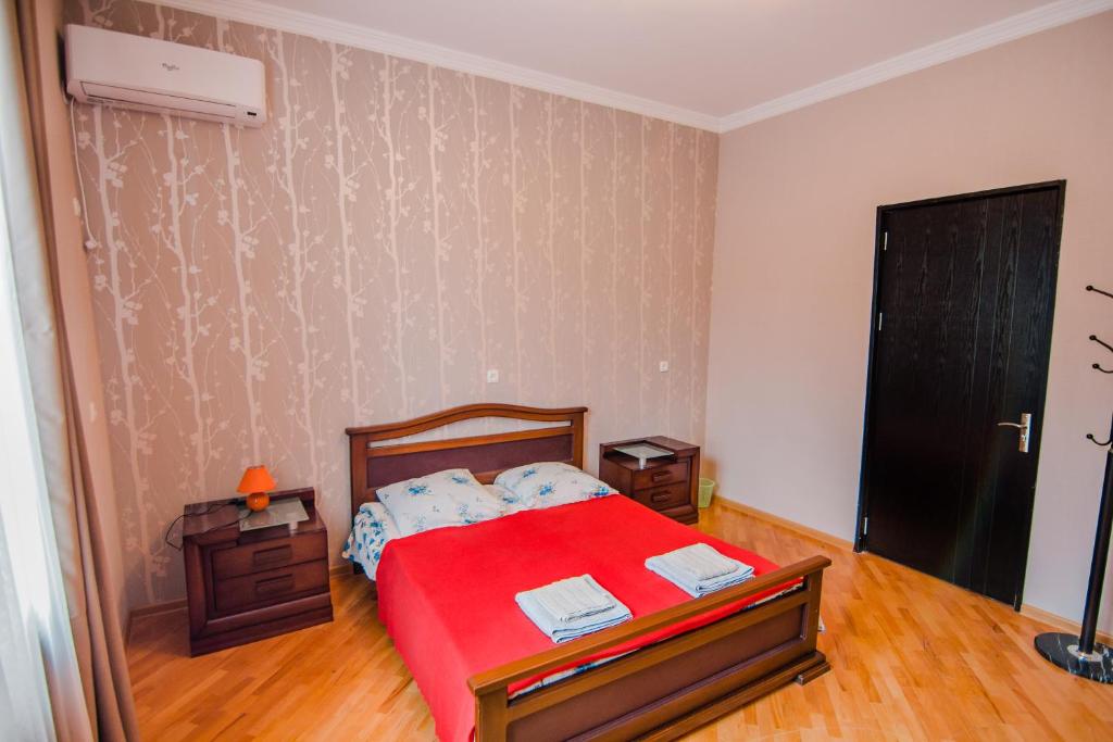 Postel nebo postele na pokoji v ubytování Dima's Guesthouse