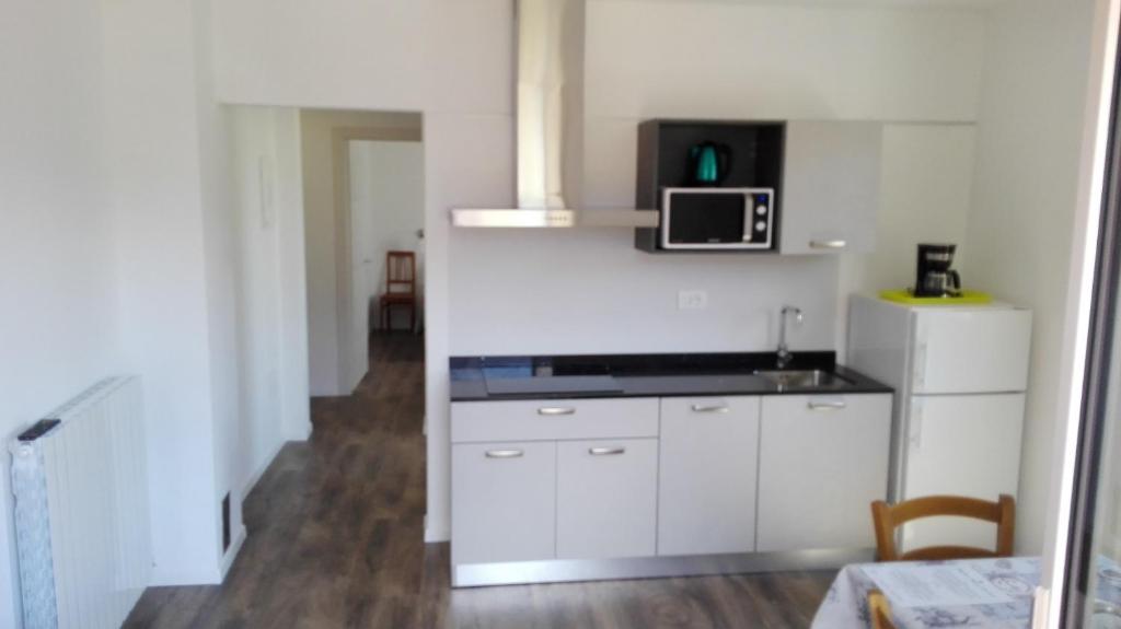 A kitchen or kitchenette at Ledro Lake Suites