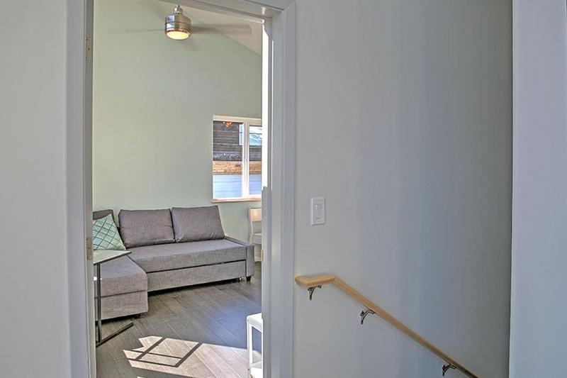 a view of a living room with a couch at The Vue B&B in Seward