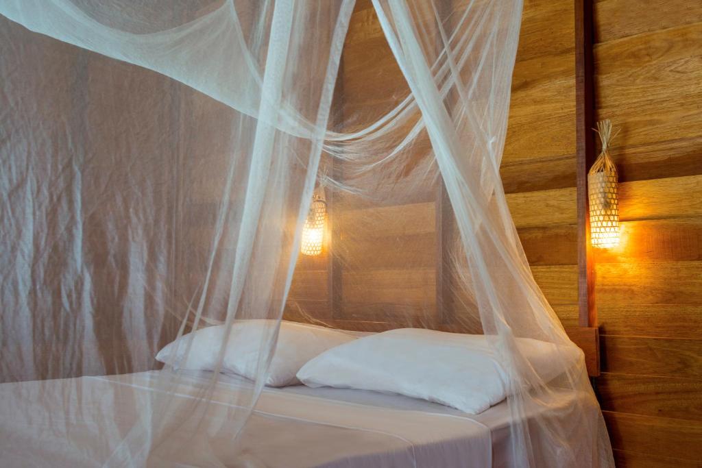 Ein Bett oder Betten in einem Zimmer der Unterkunft Castaway Resort Koh Lipe