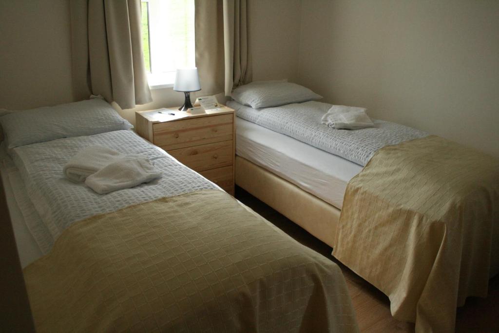 Postel nebo postele na pokoji v ubytování Guesthouse Stekkatún