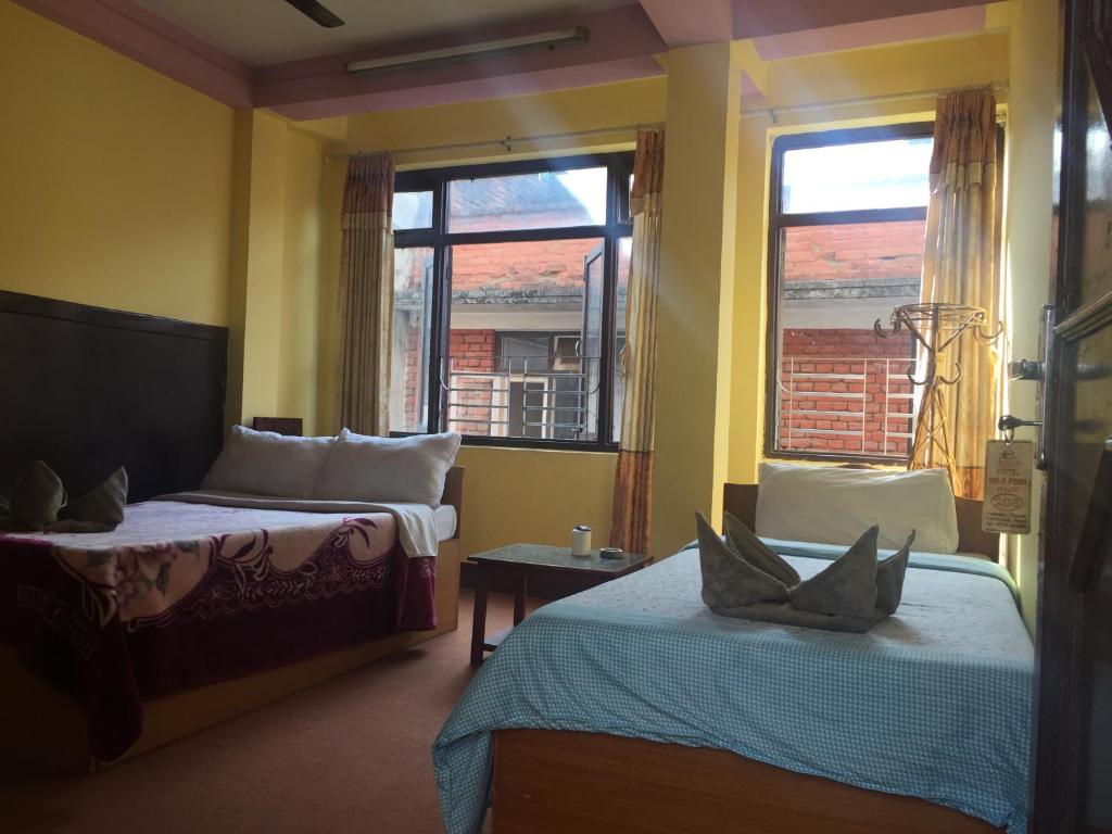 Postel nebo postele na pokoji v ubytování Hotel Yala Peak