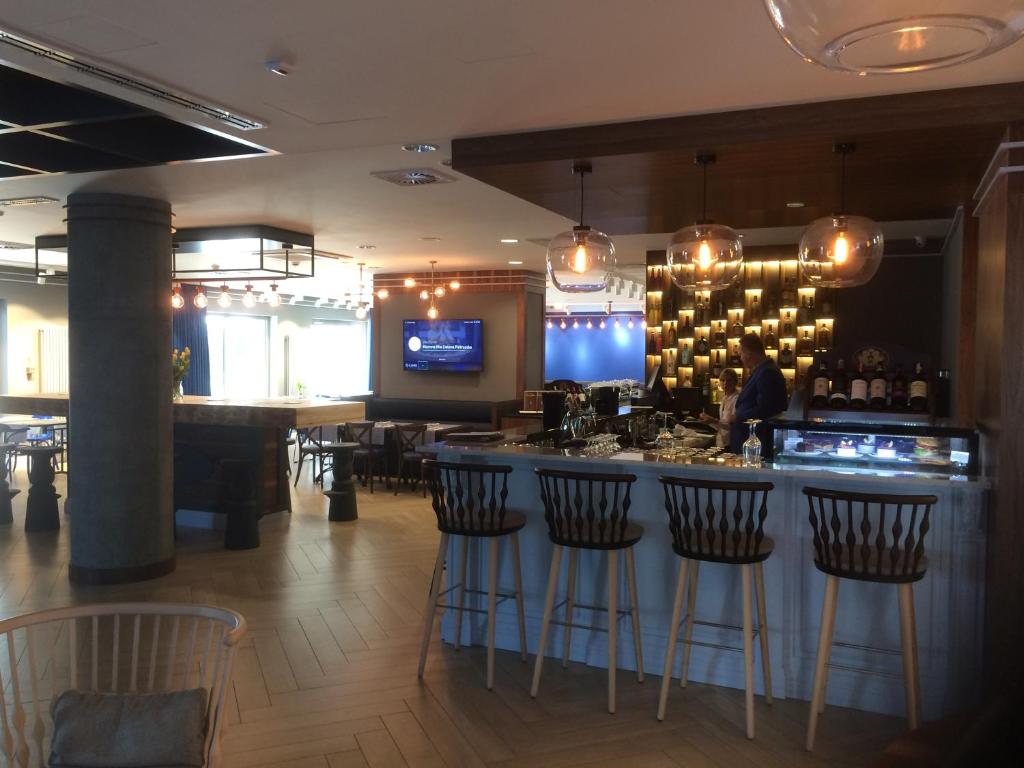 Televízia a/alebo spoločenská miestnosť v ubytovaní Apartament Nowa Motława & SPA