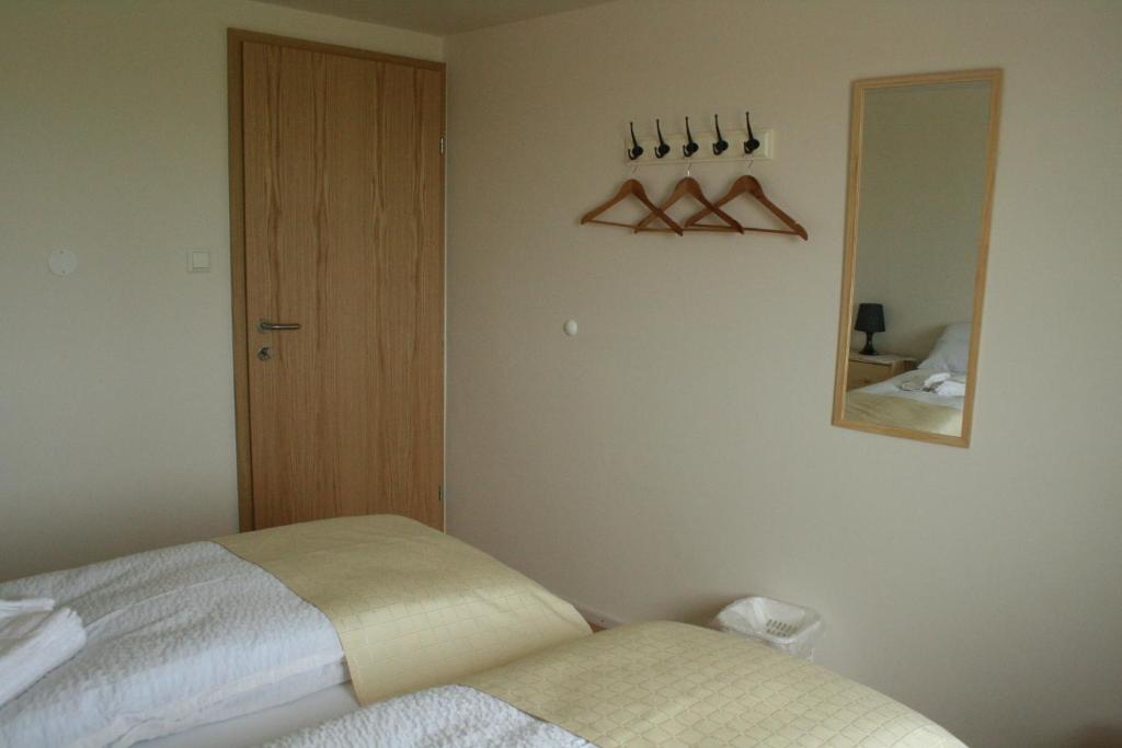 Postel nebo postele na pokoji v ubytování Guesthouse Stekkatún