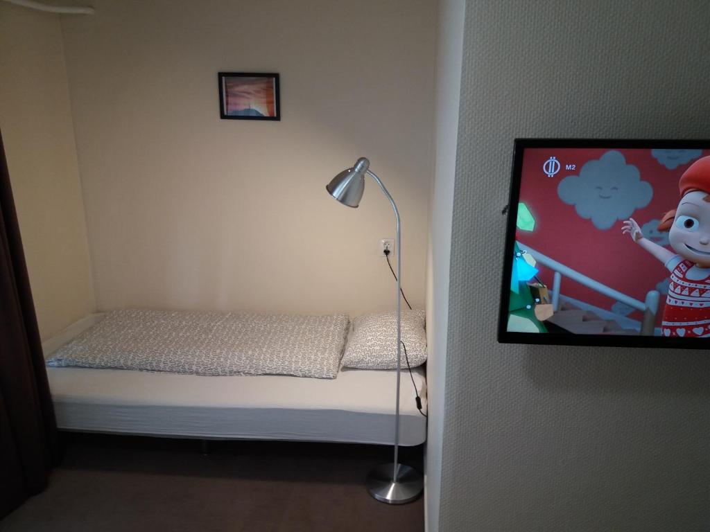 Postel nebo postele na pokoji v ubytování Mezzo Budapest