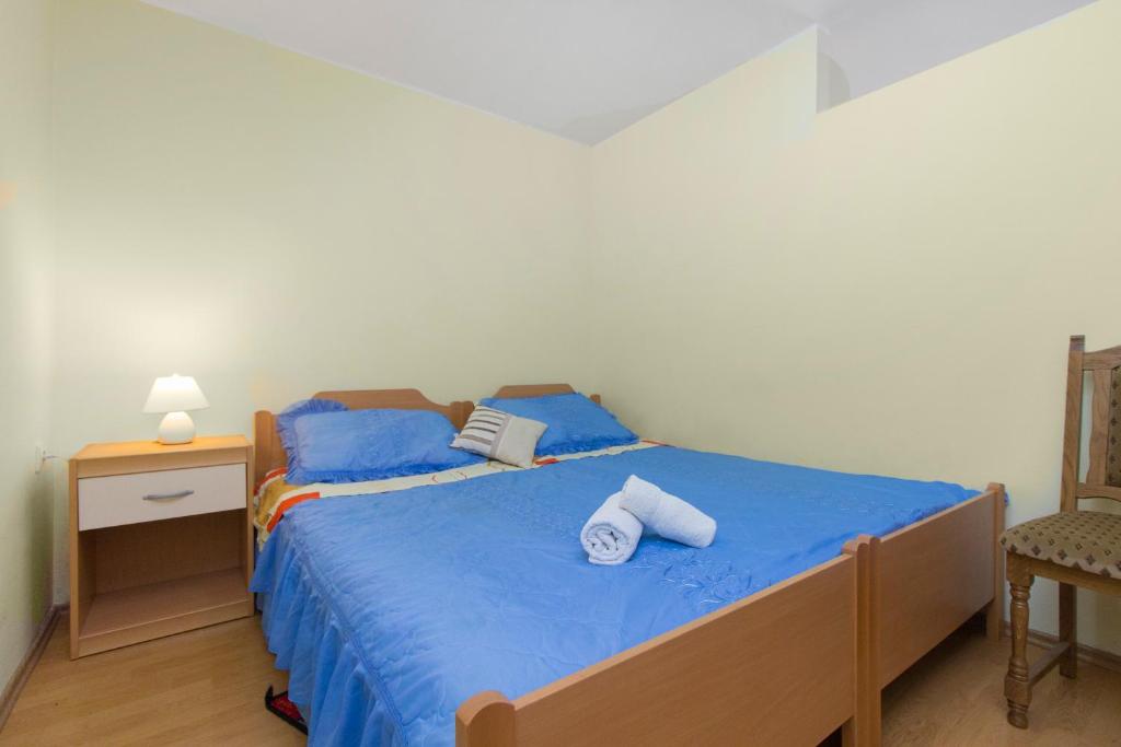Posteľ alebo postele v izbe v ubytovaní Bulat Sea View Apartments