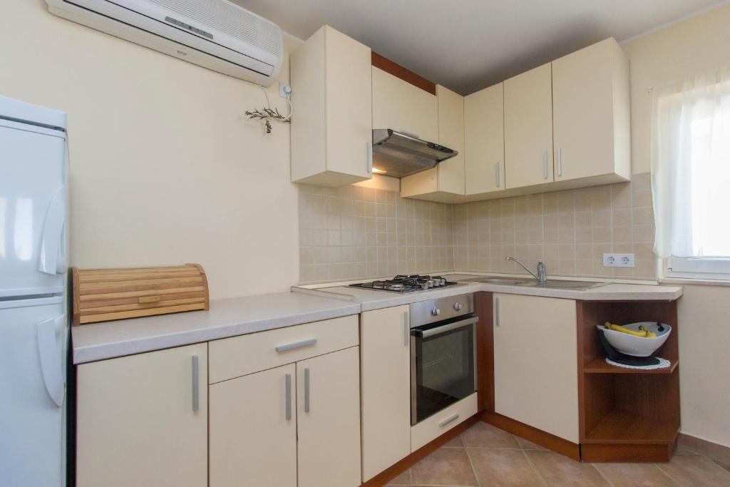 Kuchyňa alebo kuchynka v ubytovaní Bulat Sea View Apartments