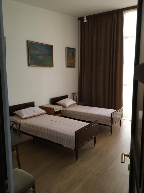 Postel nebo postele na pokoji v ubytování Art Guesthouse