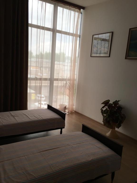 Postel nebo postele na pokoji v ubytování Art Guesthouse