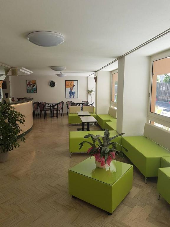 Posezení v ubytování Hotel Tre Assi