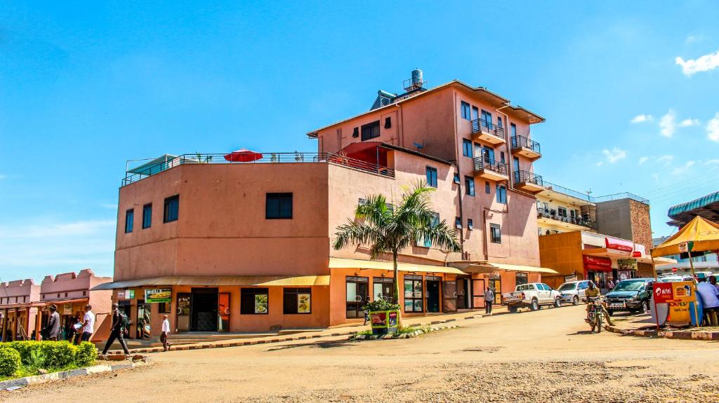 a building on the side of a street at Mbale Travellers Inn in Mbale