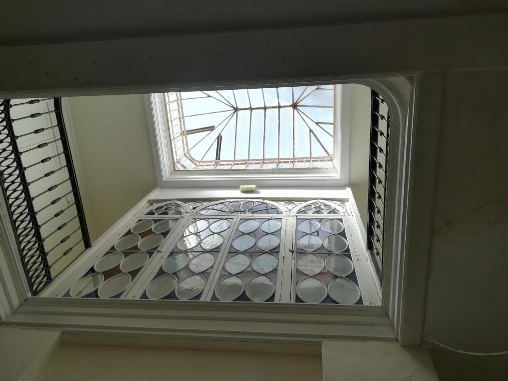 Postel nebo postele na pokoji v ubytování Nuevo Hotel
