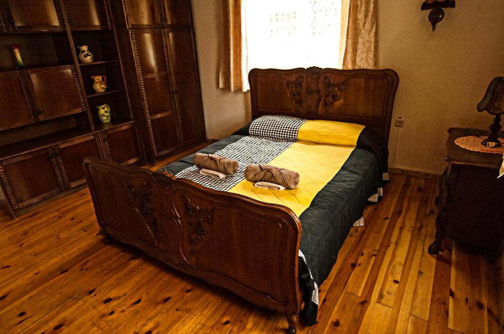 A bed or beds in a room at Vila Jelita