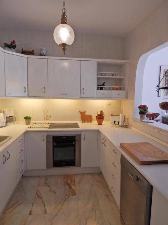 Kuchyň nebo kuchyňský kout v ubytování Apartment Burriana