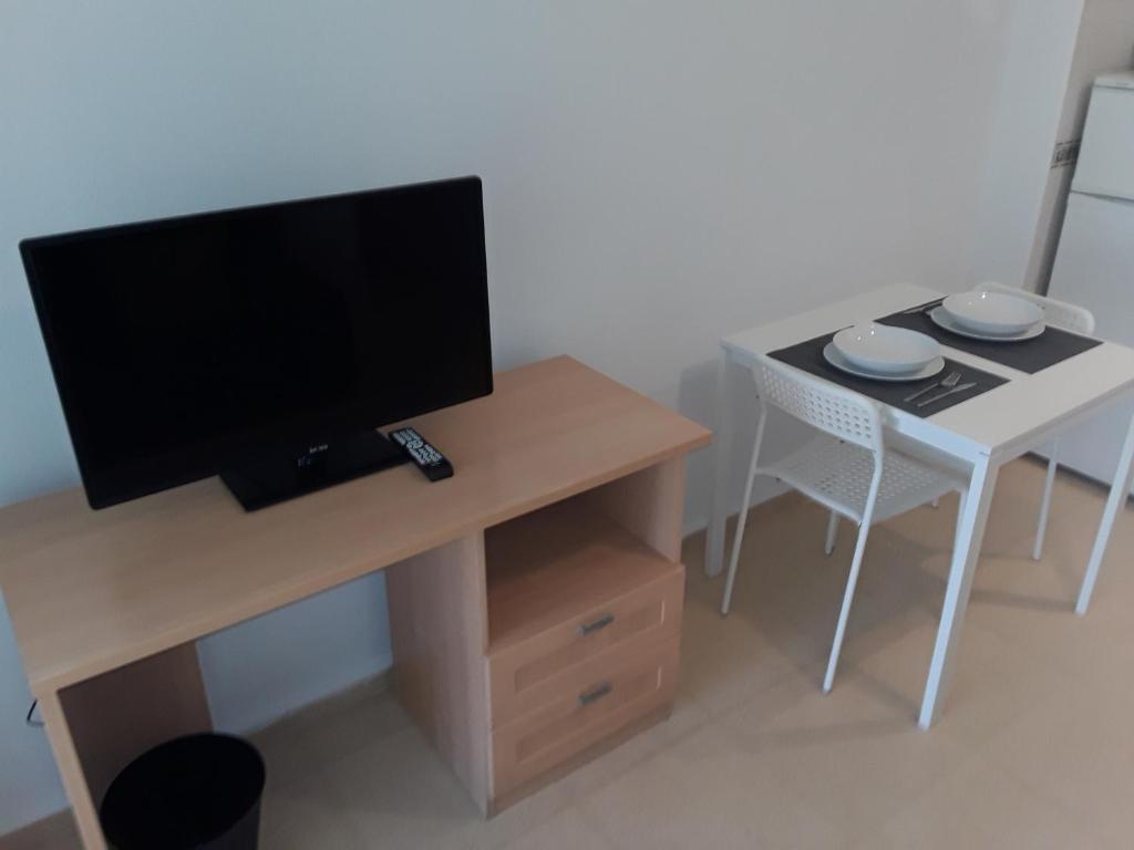 Televízia a/alebo spoločenská miestnosť v ubytovaní Fan Flat Torremolinos