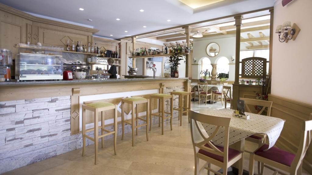 Kuchyň nebo kuchyňský kout v ubytování Alma Living Hotel- Al Girarrosto