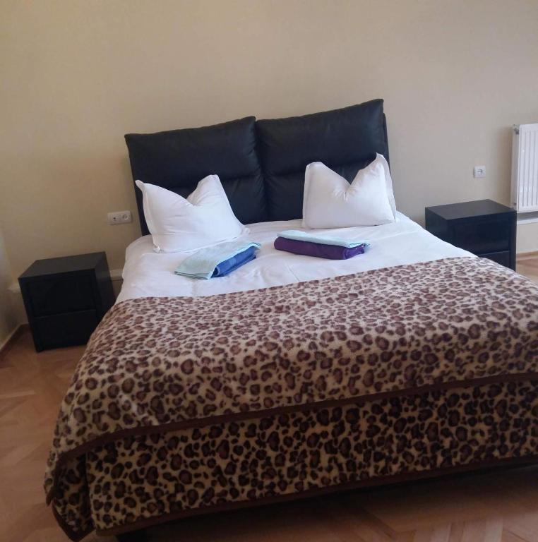 Postel nebo postele na pokoji v ubytování Hotel Renesans