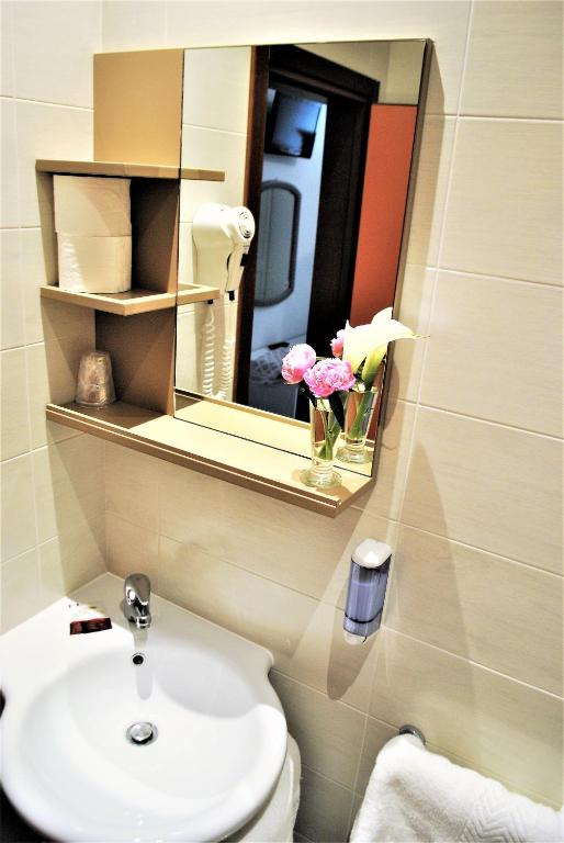 Koupelna v ubytování Hotel Picobello Pineta