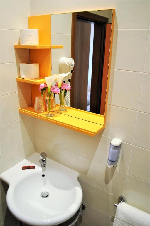 Koupelna v ubytování Hotel Picobello Pineta