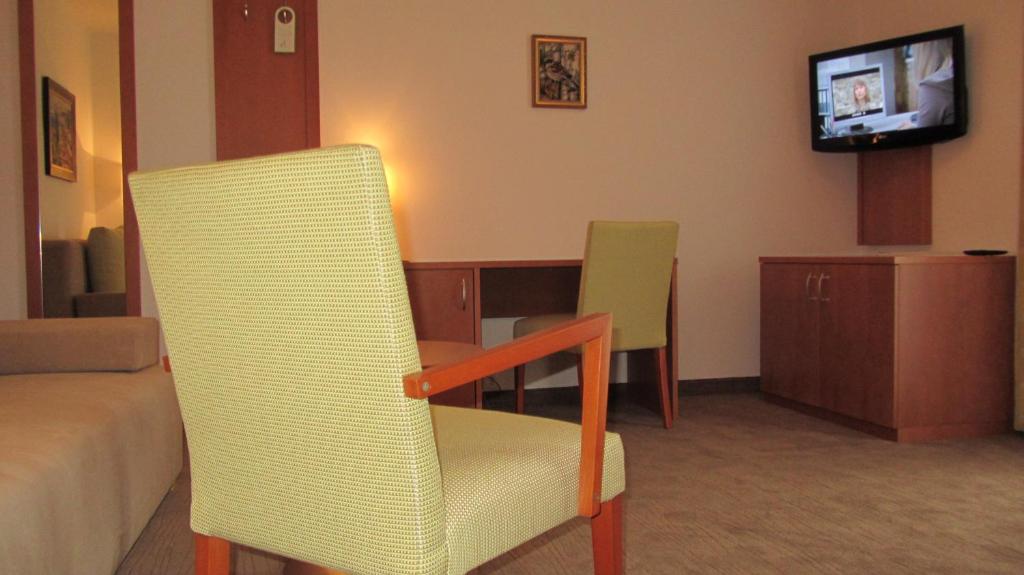 Una televisión o centro de entretenimiento en Hotel Walkner