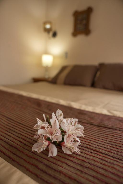 Uma cama ou camas num quarto em Weisserhaus