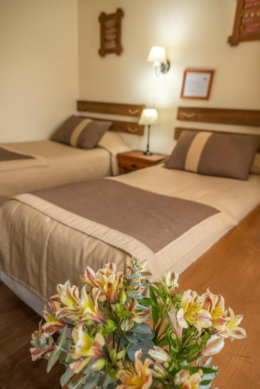 Uma cama ou camas num quarto em Weisserhaus