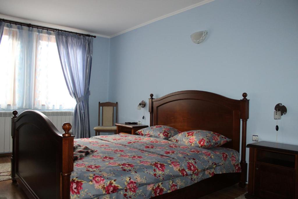 Posteľ alebo postele v izbe v ubytovaní Guest House Maria