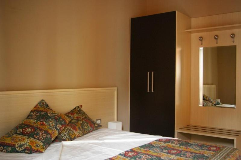 Postel nebo postele na pokoji v ubytování SoloSonno