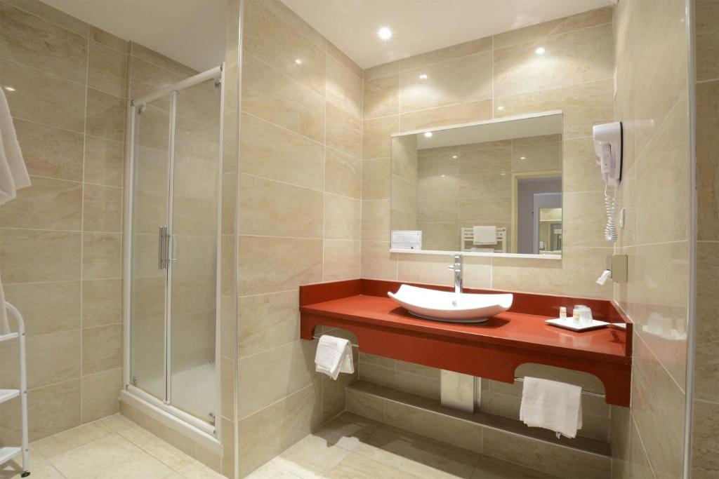 Koupelna v ubytování Hotel Poretta
