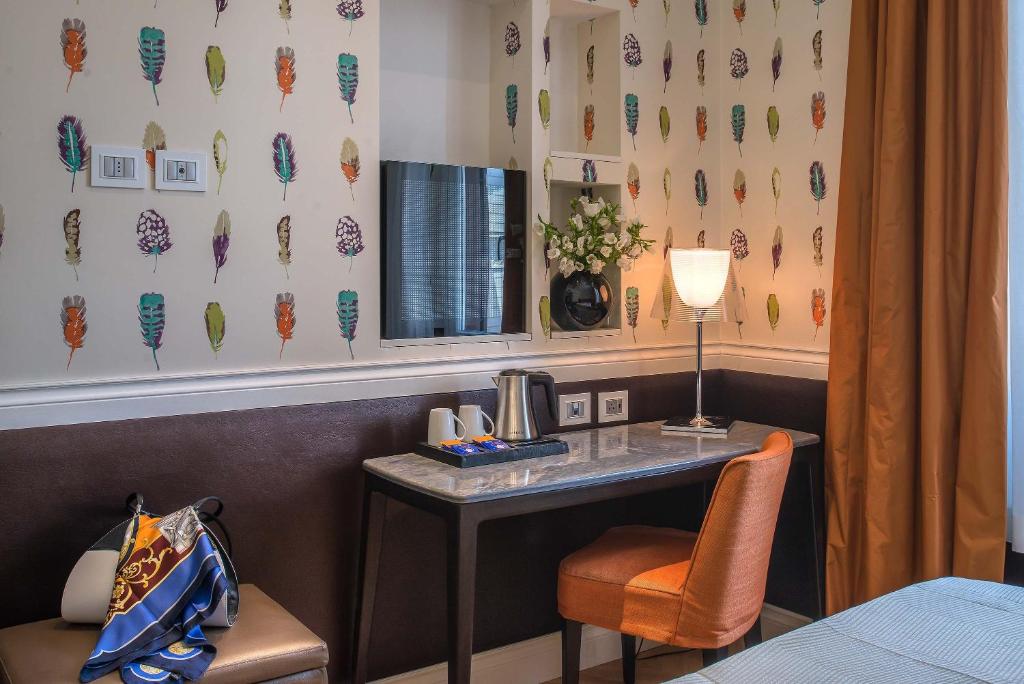 Postel nebo postele na pokoji v ubytování Hotel Damaso