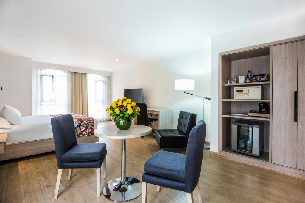 Kuchyň nebo kuchyňský kout v ubytování Hotel Rosales Plaza