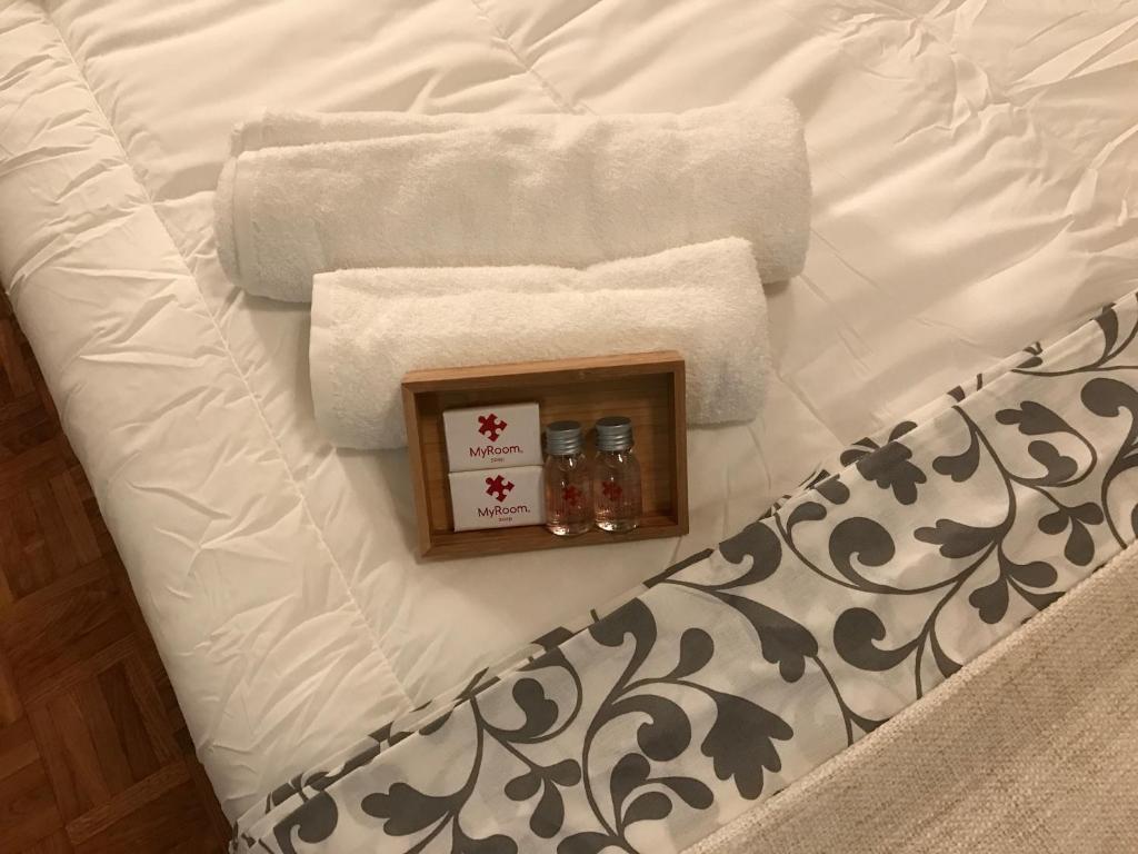 Posteľ alebo postele v izbe v ubytovaní MyRoom Station In Town 2