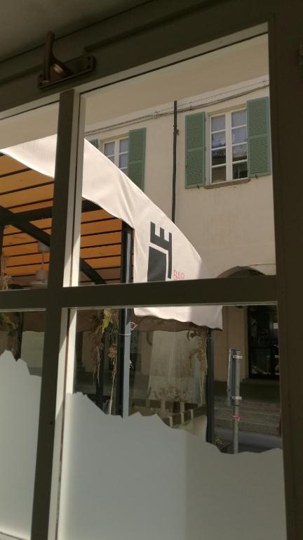Balkón nebo terasa v ubytování Palazzo Sacco Hostello Fossano
