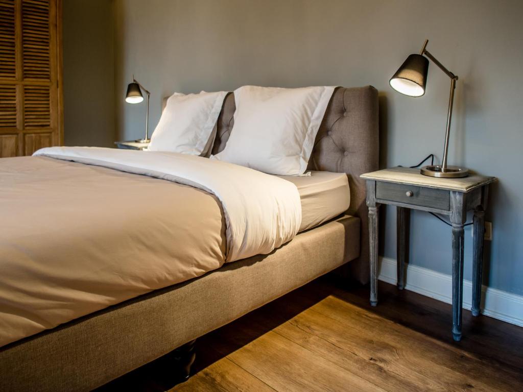 Postel nebo postele na pokoji v ubytování Maison Willem Tell