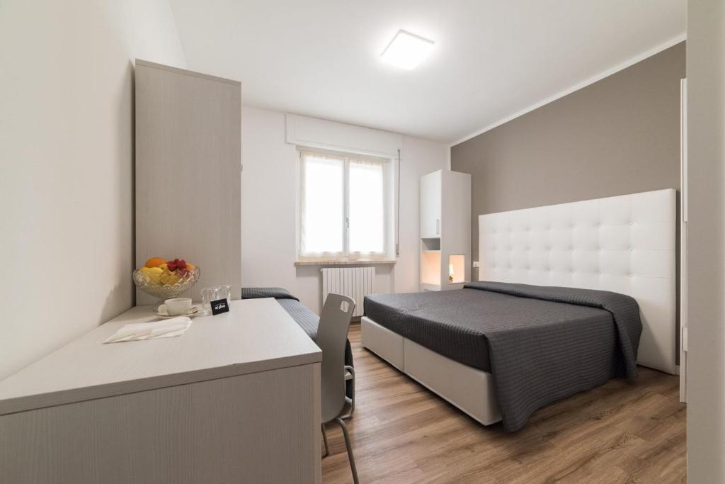 Postel nebo postele na pokoji v ubytování Albergo Al Sole