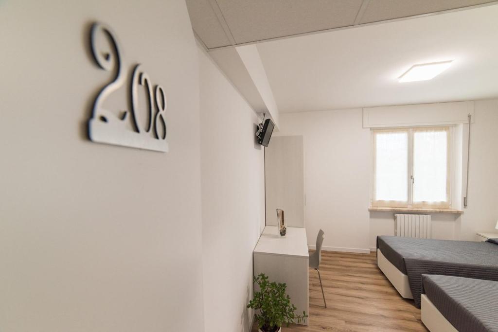 Postel nebo postele na pokoji v ubytování Albergo Al Sole