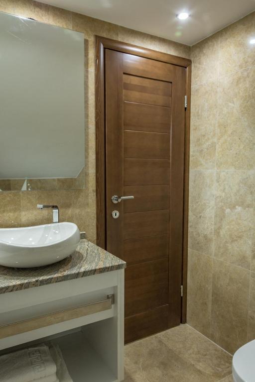 Koupelna v ubytování Apartmani Mendula