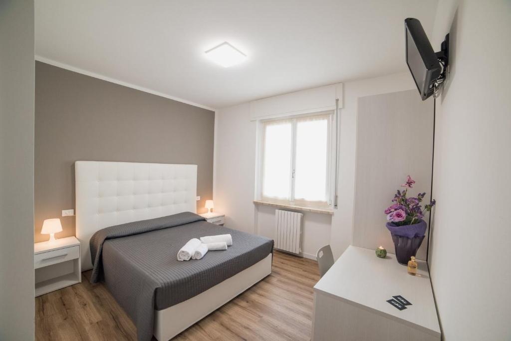TV a/nebo společenská místnost v ubytování Albergo Al Sole