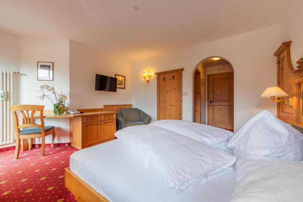 Postel nebo postele na pokoji v ubytování Hotel Hubertushof