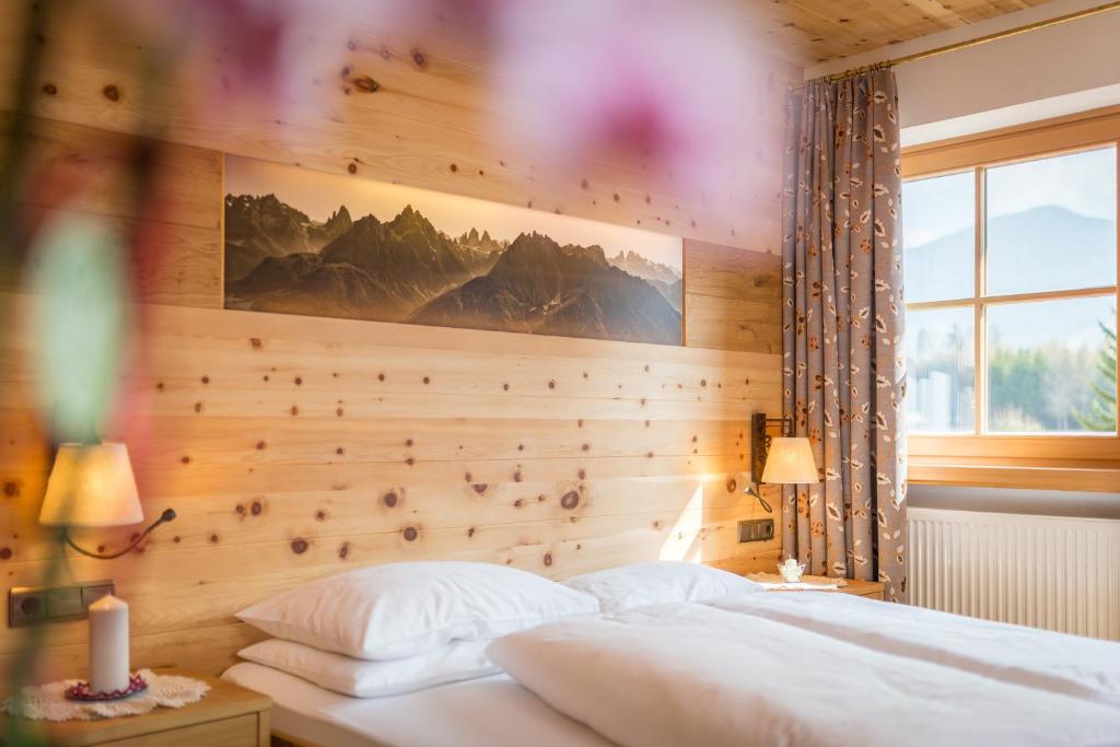Postel nebo postele na pokoji v ubytování Hotel Hubertushof
