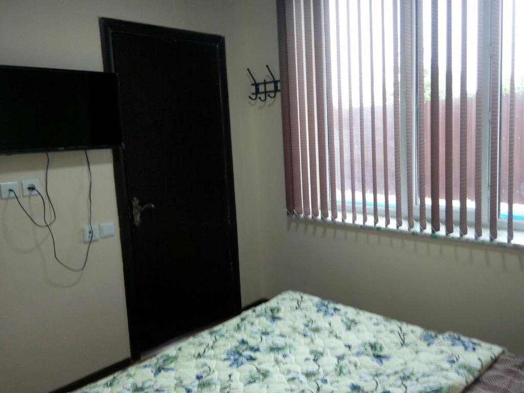 Postel nebo postele na pokoji v ubytování Yukon