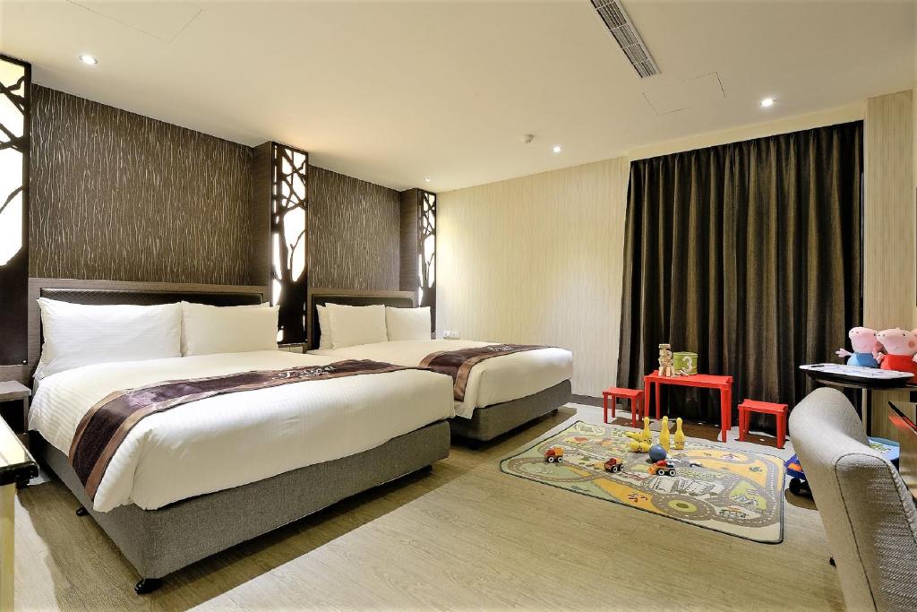 Postel nebo postele na pokoji v ubytování J-HOTEL